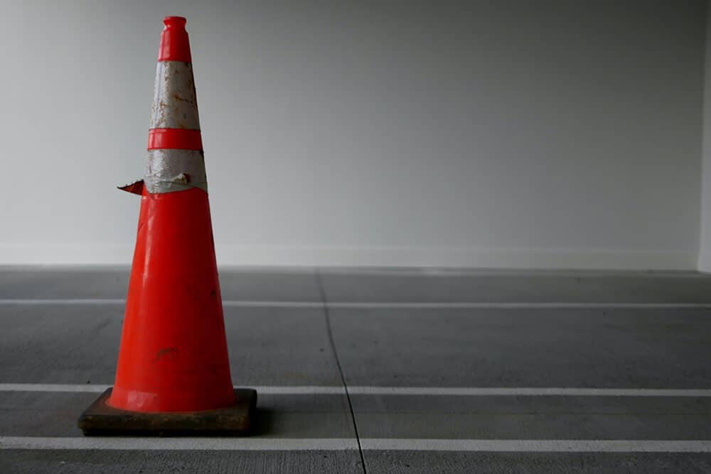 Orange traffic cone on street