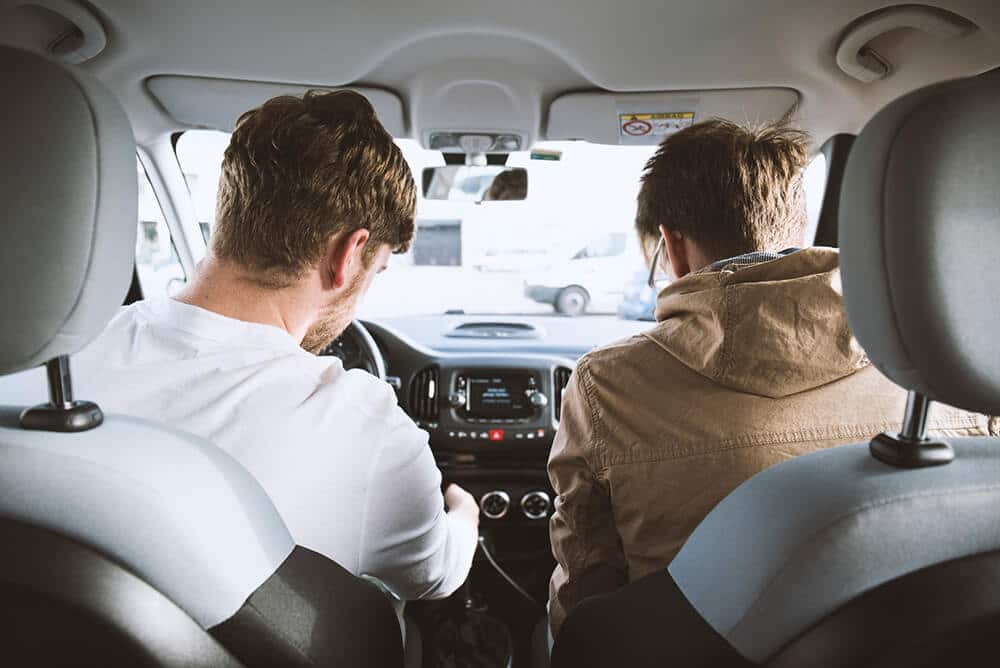 Driver and passenger in car