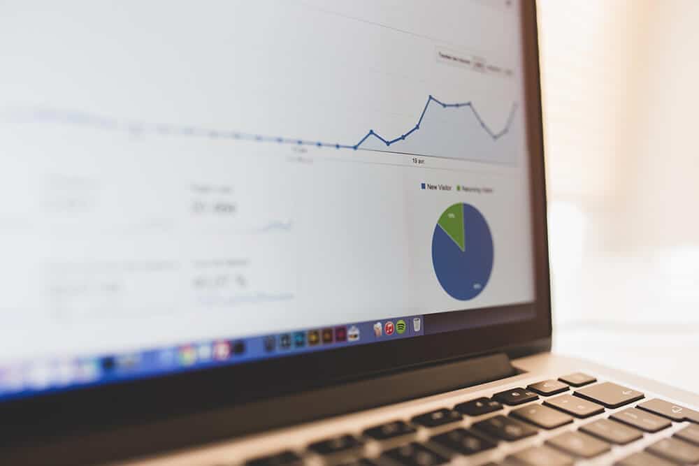 Laptop showing graph and chart