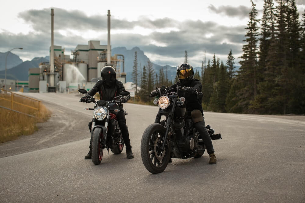 motorcyclists wearing helmets